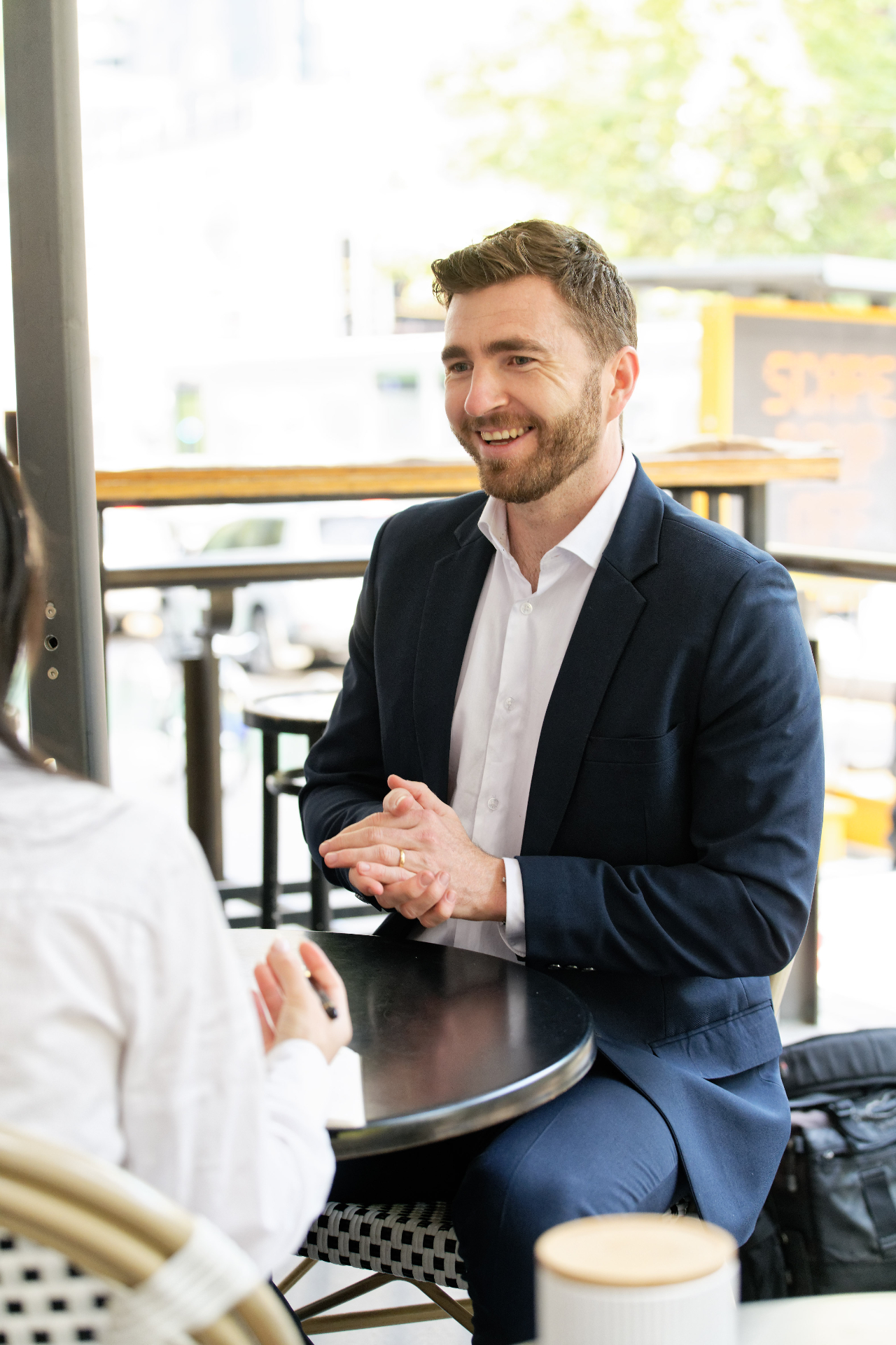 A BlockByte adviser meeting with a client
